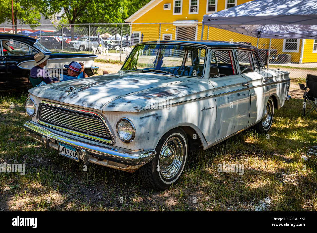 Falcon Heights, MN - June 18, 2022: High perspective front corner view of a 1962 AMC Rambler American 4 Door Hardtop at a local car show. Stock Photo