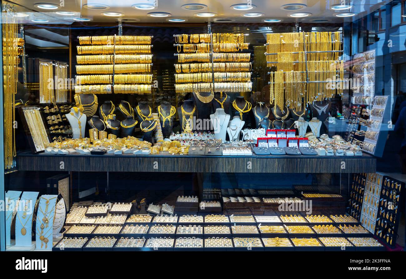 Gold jewelry in glass windows of street shops in Konya Stock Photo - Alamy