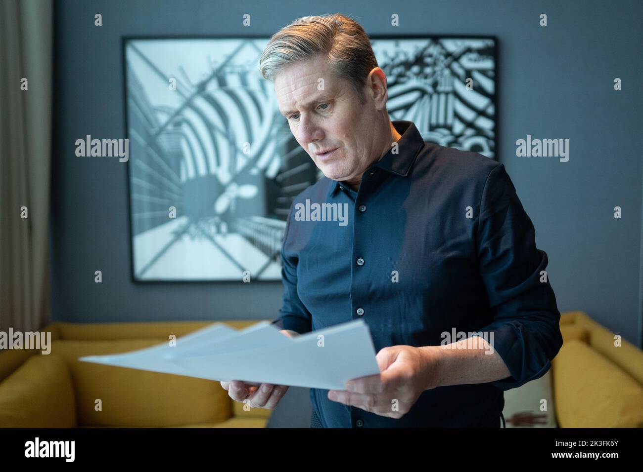 Labour leader Sir Keir Starmer in his hotel room in Liverpool preparing for his speech to delegates at the Labour Party Conference on Tuesday. Picture date: Monday September 26, 2022. Stock Photo