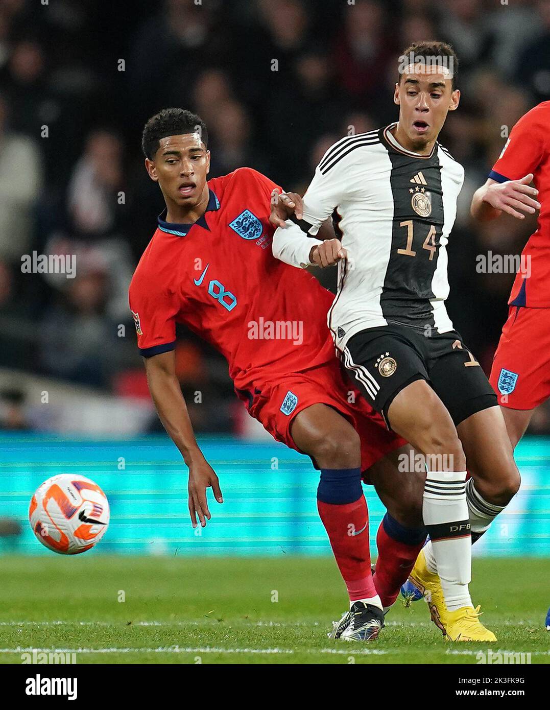 England's Jude Bellingham and Germany's Jamal Musiala during the UEFA Nations League match at Wembley Stadium, London. Picture date: Monday September 26, 2022. Stock Photo