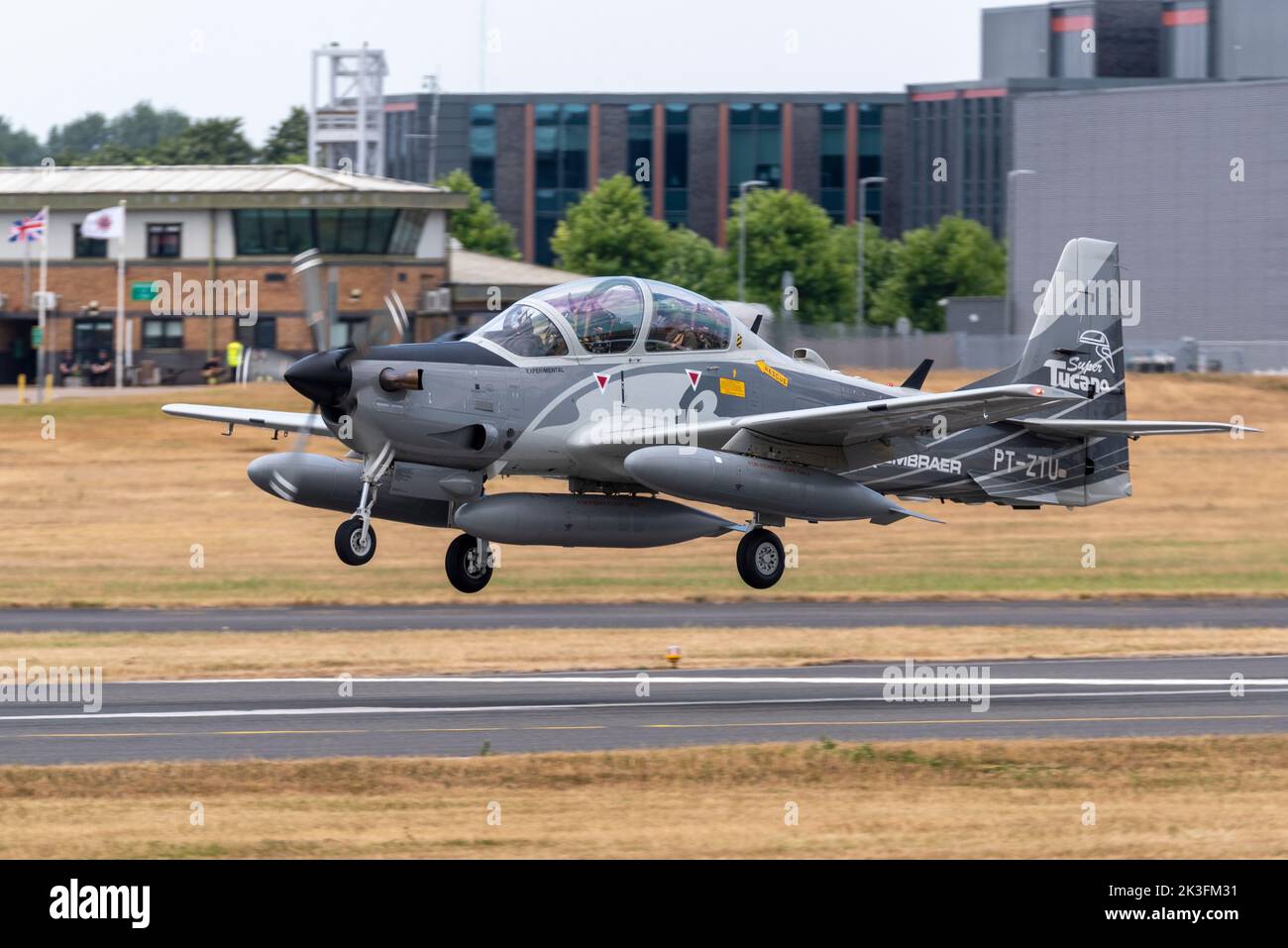 Embraer EMB 314 Super Tucano, also named ALX or A-29, turboprop light attack aircraft landing after display at Farnborough International Airshow 2022 Stock Photo