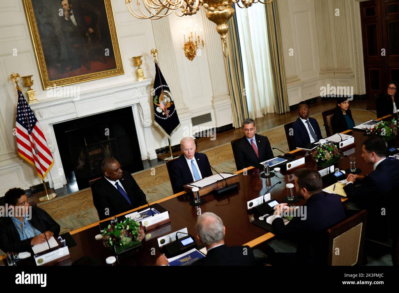 U.S. President Joe Biden, seated between Defense Secretary Lloyd Austin and Secretary of Health and Human Services (HHS) Xavier Becerra,  delivers remarks at a meeting of the White House Competition Council in the State Dining Room of the White House in Washington, U.S. September 26, 2022.  REUTERS/Jonathan Ernst Stock Photo