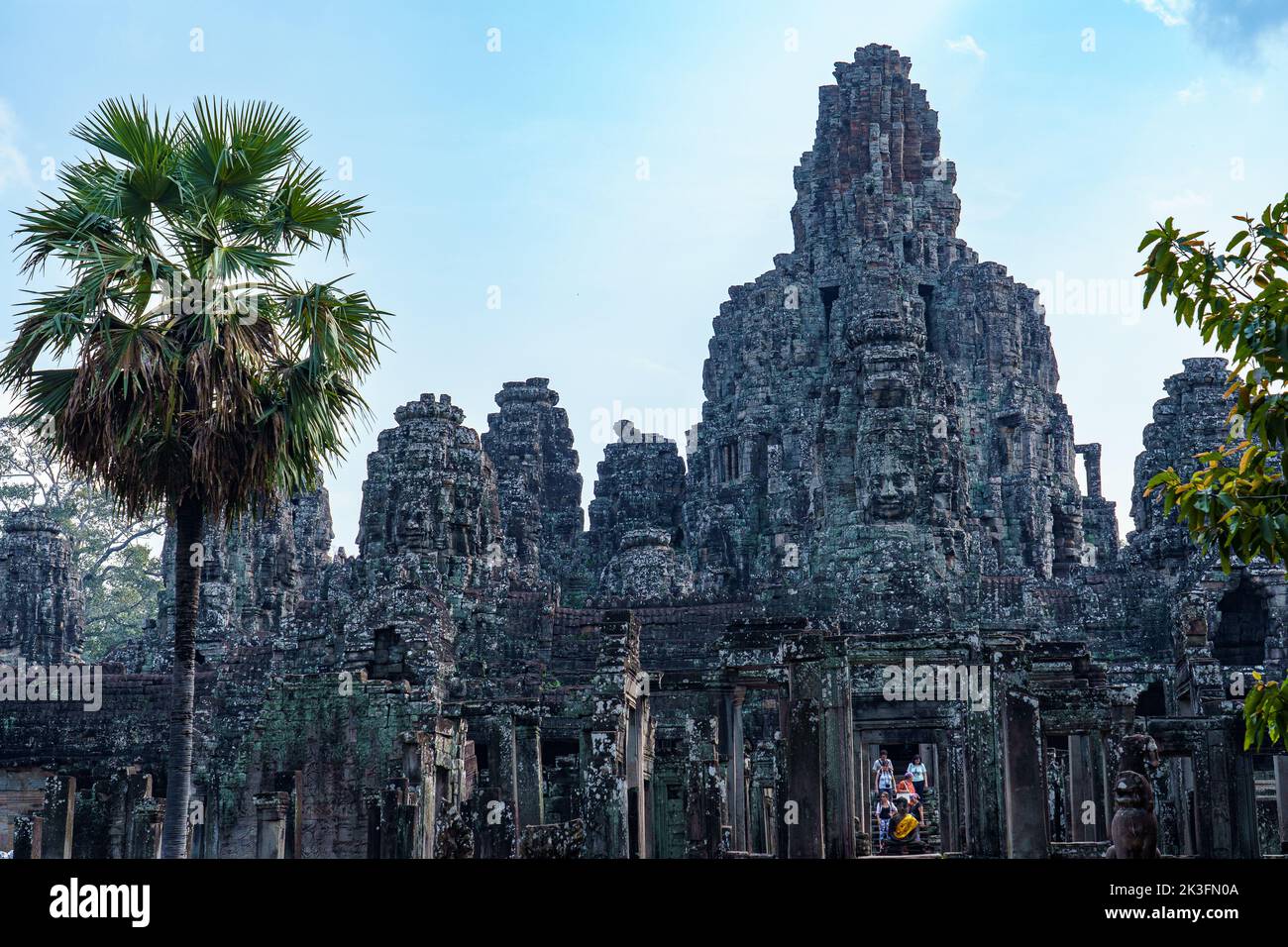 Cambodia. Siem Reap. The archaeological park of Angkor. Tourists visiting Bayon Temple 12th century Hindu temple Stock Photo