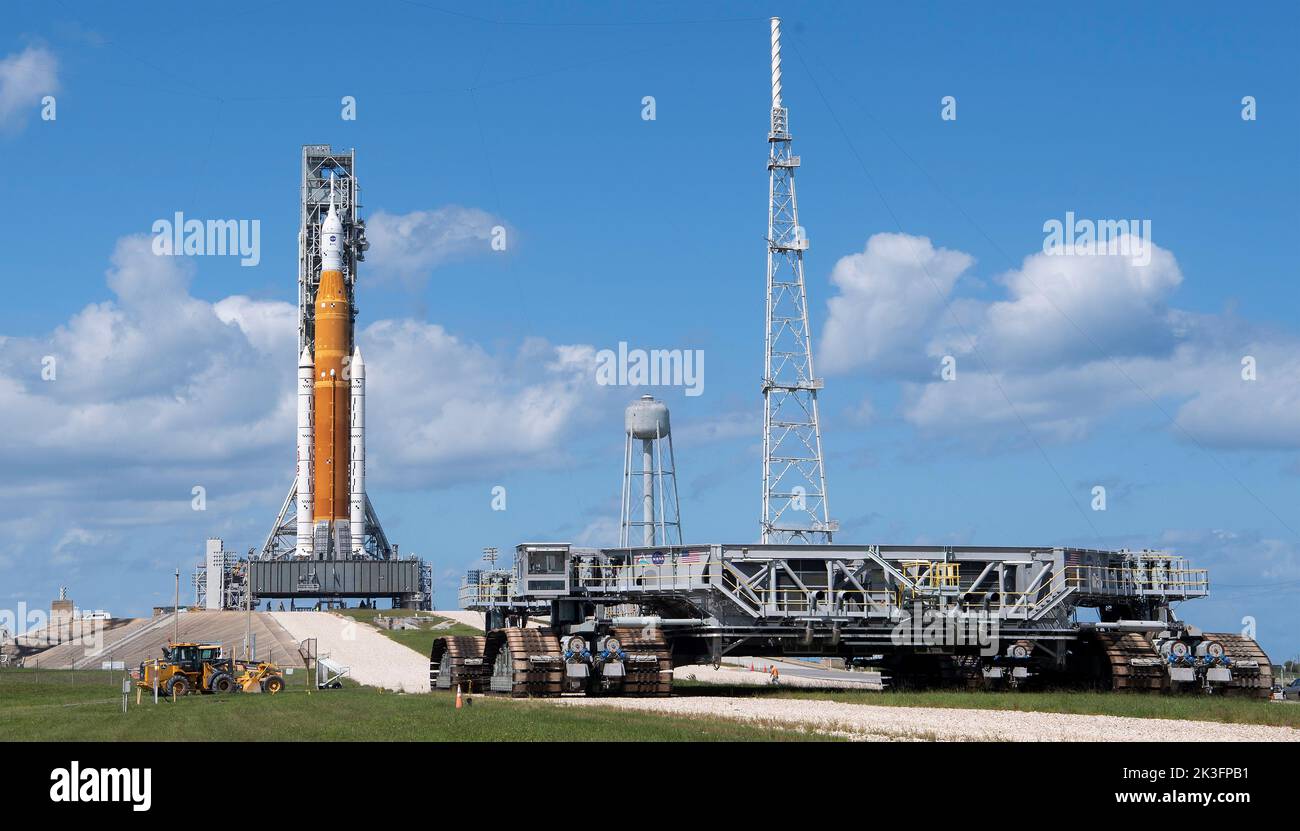 Kennedy Space Center, United States of America. 24 September, 2022. The NASA crawler transporter makes way to the Artemis Space Launch System rocket and Orion spacecraft on Launch Complex 39B at the Kennedy Space Center, September 24, 2022, in Cape Canaveral, Florida. The SLS rocket is being rolled back to the Vehicle Assembly Building to protect it from approaching Hurricane Ian. Credit: Joel Kowsky/NASA/Alamy Live News Stock Photo