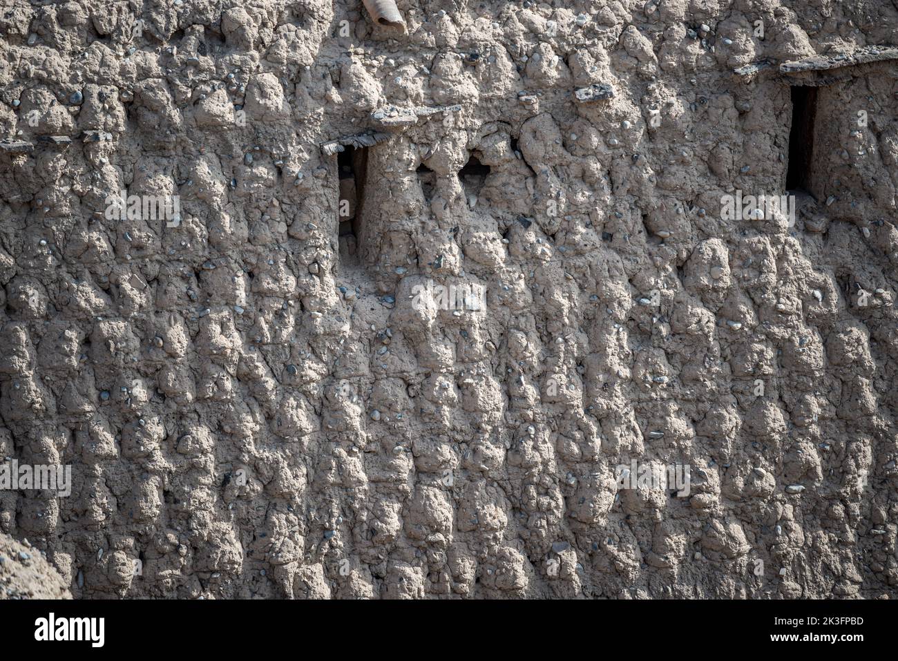 Detail of mud walls of Bahla Fort Citadel, Oman Stock Photo