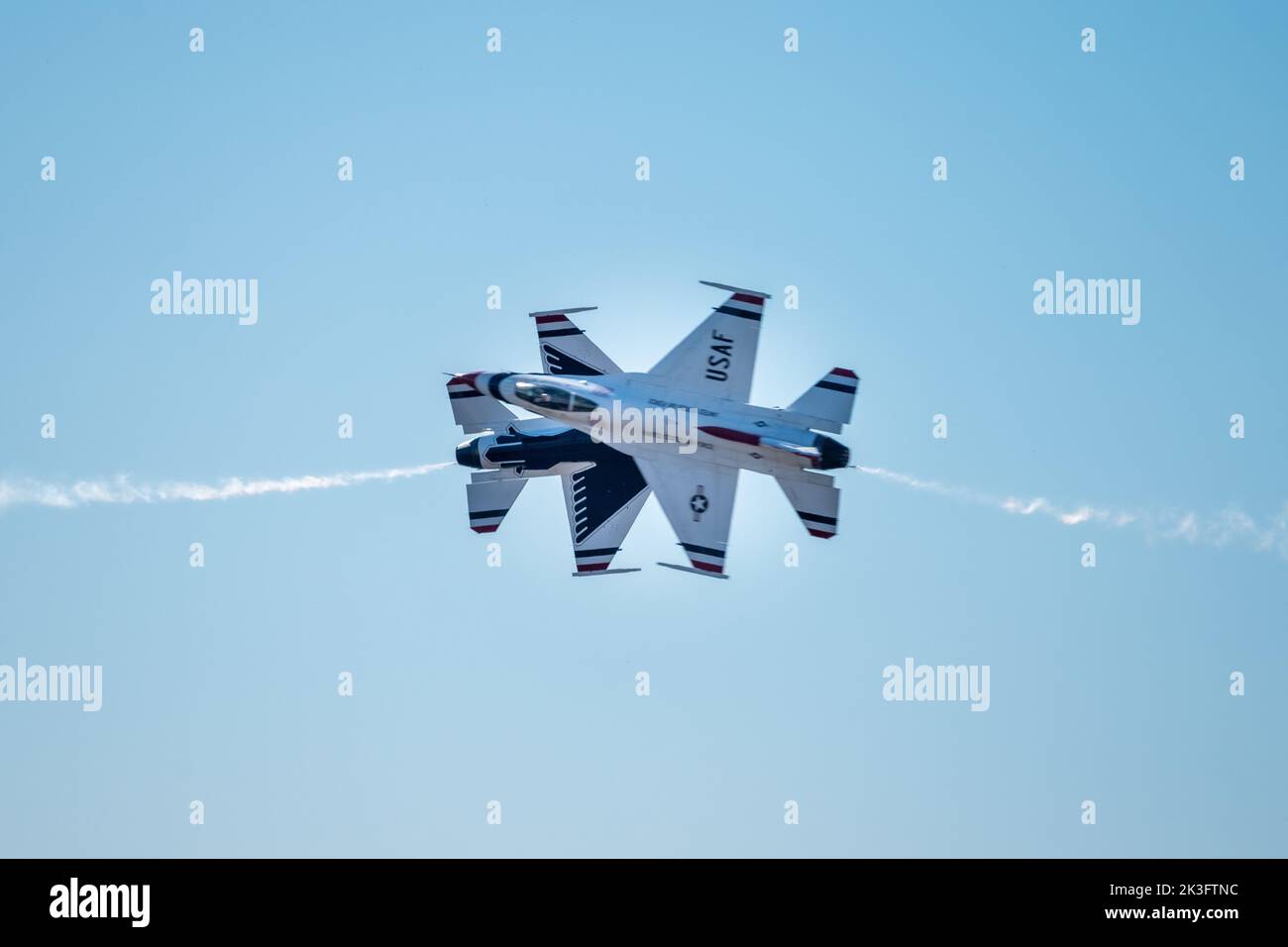 Two U.S. Air Force Thunderbirds cross each other at 300 miles per hour