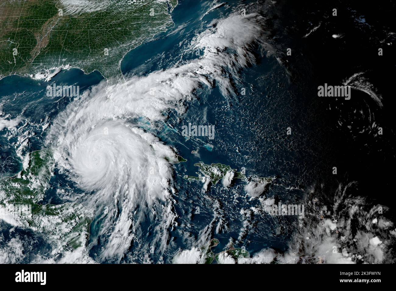 Washington, United States. 26th Sep, 2022. Hurricane Ian is pictured at 5:29 PM EST on Monday, September 26, 2022, as it approaches western Cuba, where it's expected to make landfall overnight before emerging over the southeastern Gulf of Mexico on Tuesday. Forecasters see Hurricane Ian approaching the west coast of Florida on Wednesday into Thursday, where Gov. Ron DeSantis has declared a state of emergency throughout the entire state. Photo by NOAA/UPI Credit: UPI/Alamy Live News Stock Photo