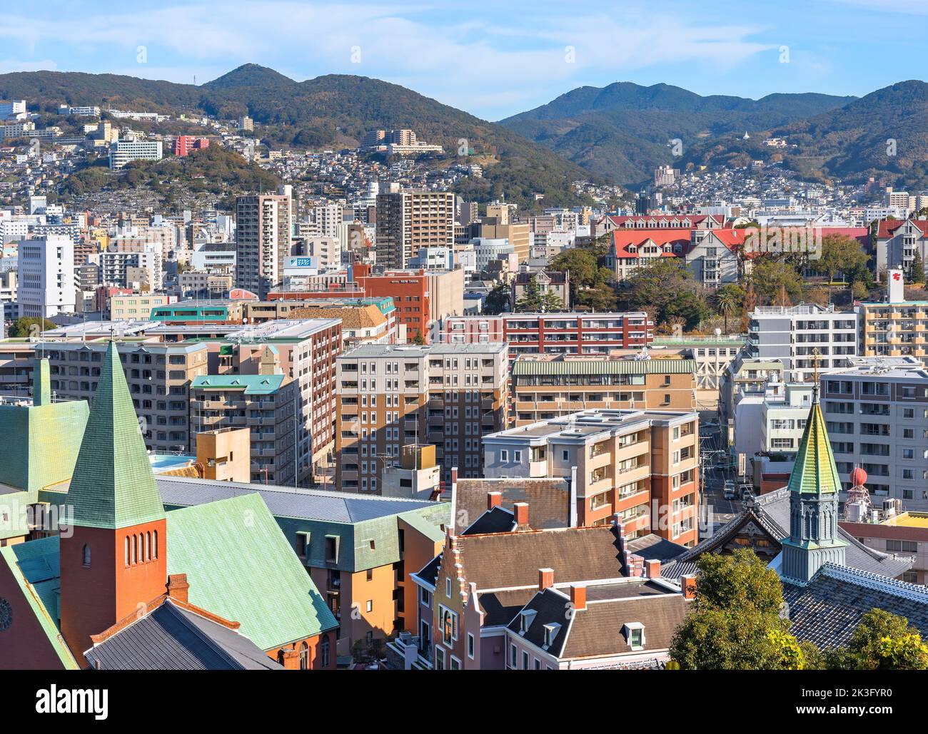 nagasaki, kyushu - december 13 2021: Bird's-eye view from Glover Garden of the campanile or bell tower of the Oura Catholic Church and Cathedral at fo Stock Photo