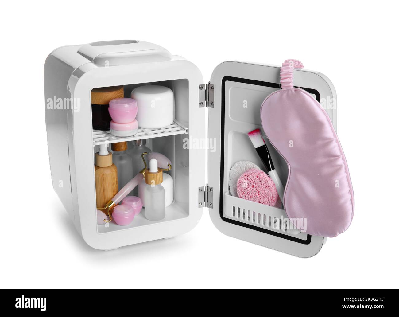 Small refrigerator with natural cosmetics, sponges, brush and sleeping ...