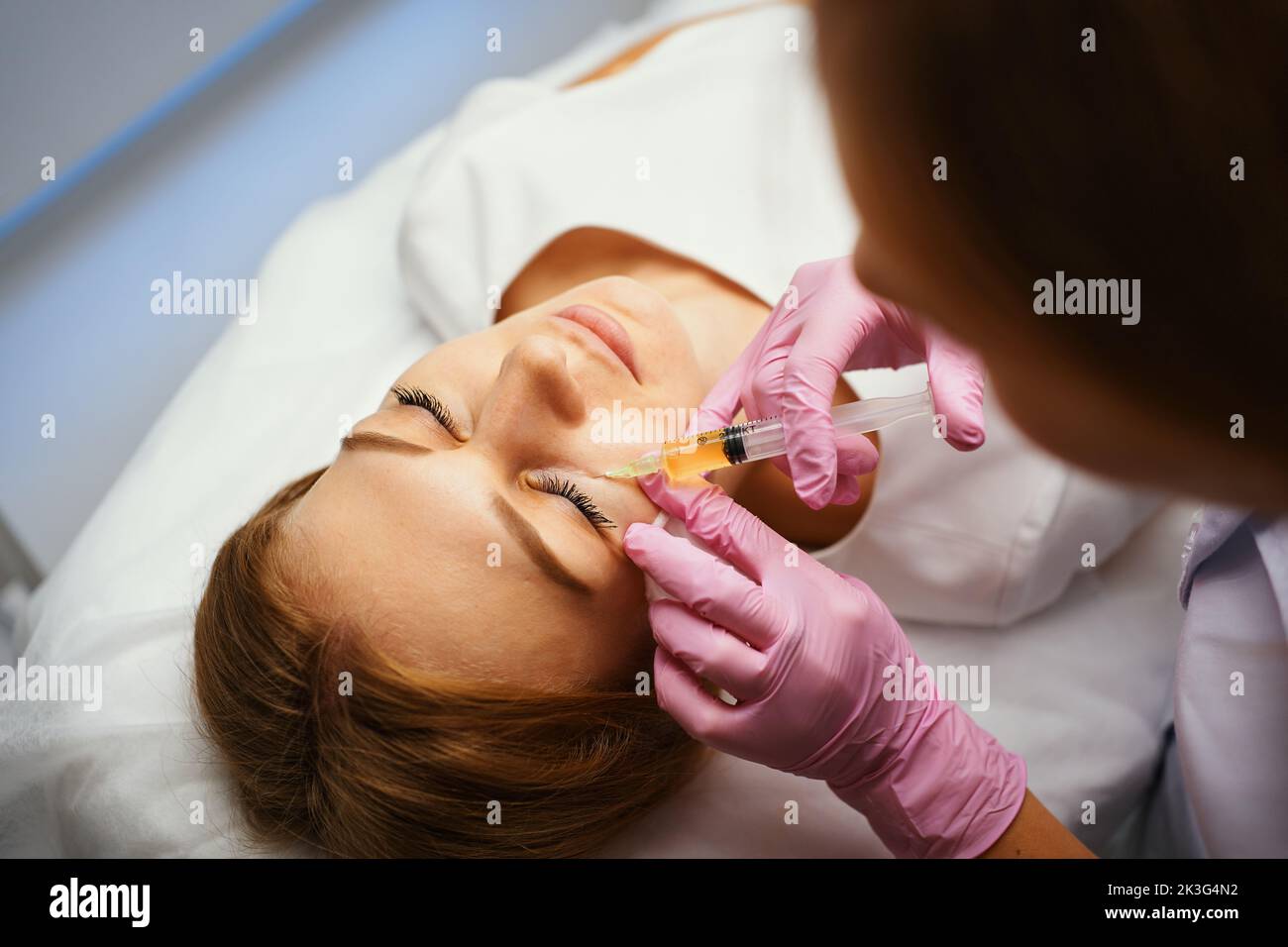 Injections of blood plasma in the face and head Stock Photo Alamy
