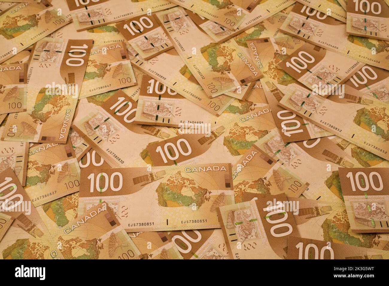 Canadian OneHundred dollar currency bank notes laid flat, Studio