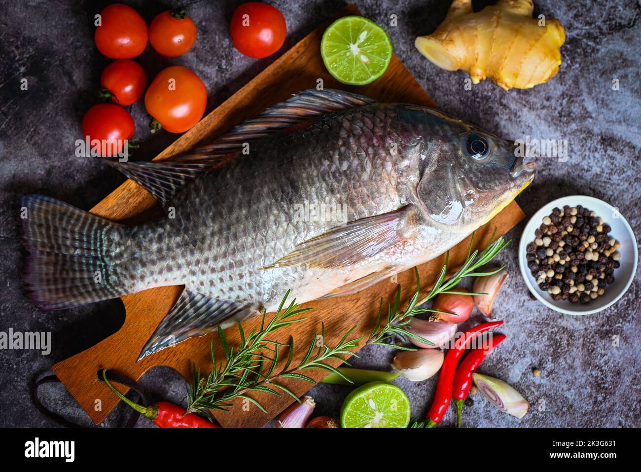 Tilapia with spice rosemary tomato lemon lime ginger garlic pepper