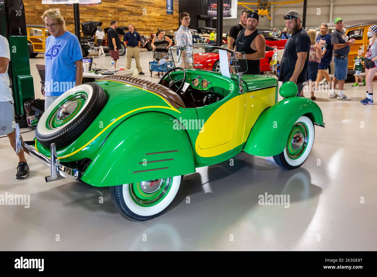 A green and yellow 1940 American Bantam Roadster on display at the Worldwide Auctioneers 2022 Auburn Auction in Auburn, Indiana, USA. Stock Photo