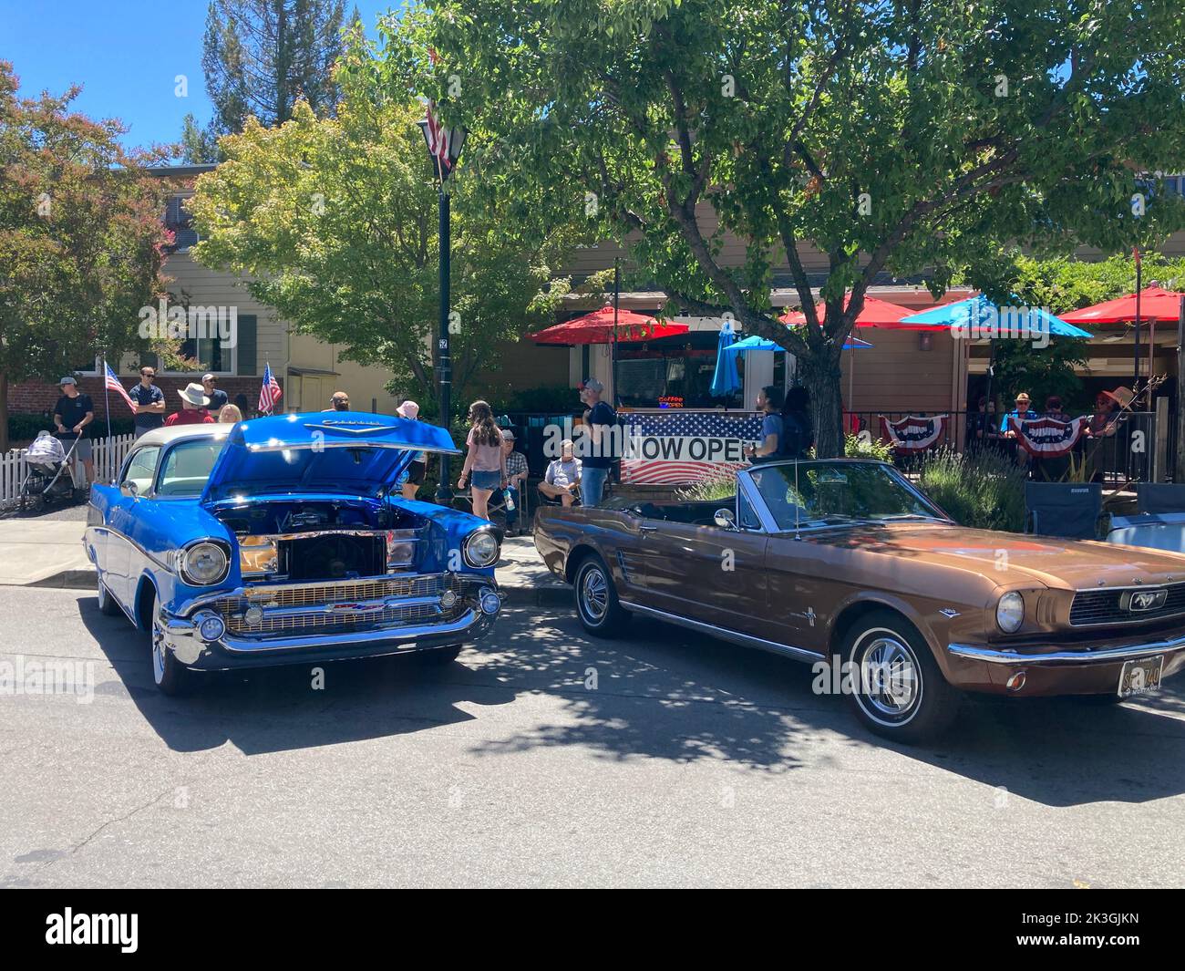 Colorful cars parked and displayed on the street during Classic and