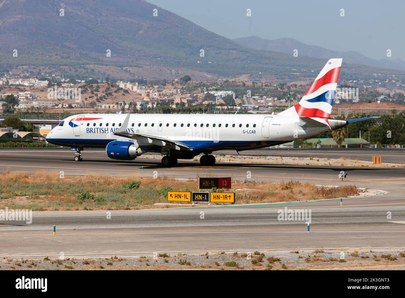 A BA CityFlyer Embraer 190 lining up at Malaga Costa del Sol airport. BA CityFlyer is a British regional airline, a subsidiary of British Airways. It operates a network of domestic and European services from its base at London City Airport. All services operate with BA's full colours, titles and flight numbers Stock Photo