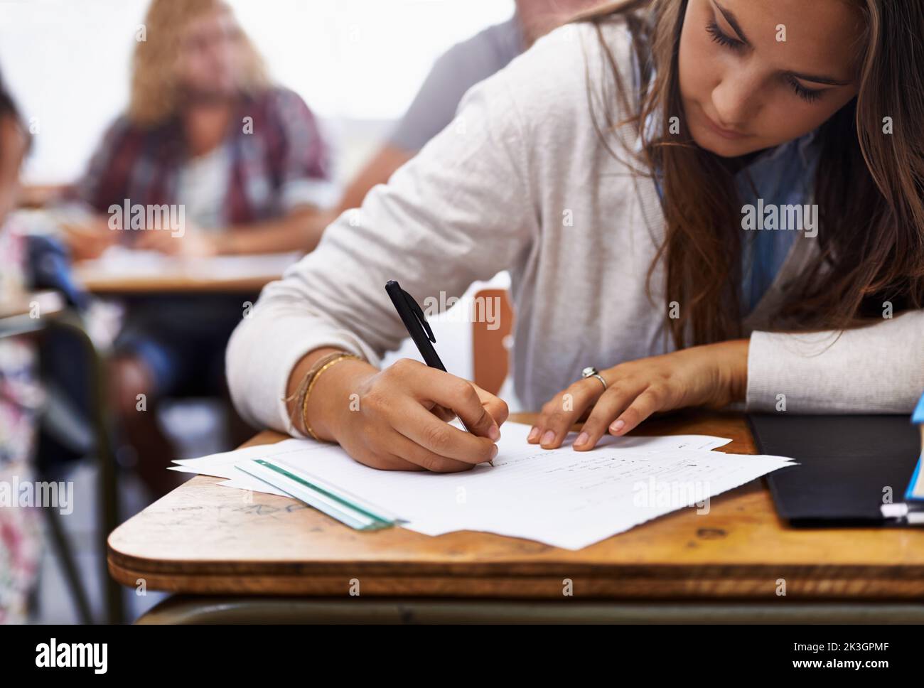 Working towards their future. students in a university classroom. Stock Photo