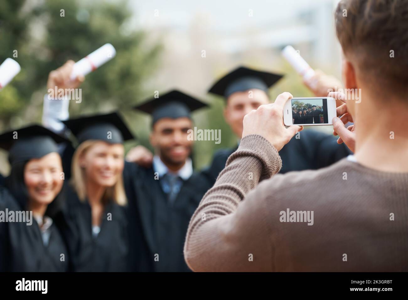 Female college graduate in cap and gown - Stock Image - F018/4992 - Science  Photo Library