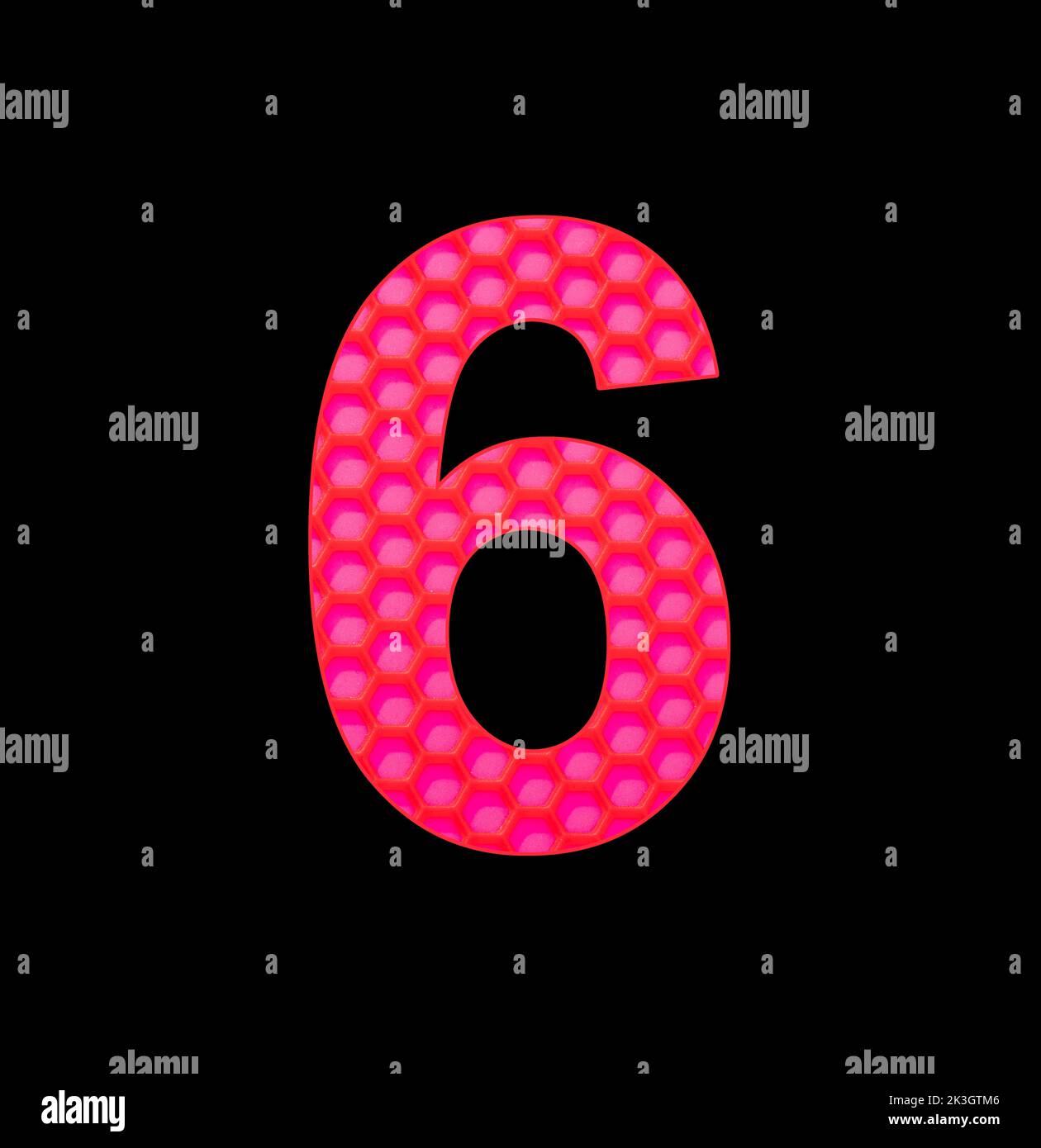 Number 6 on background with red silicone hexagonal Stock Photo - Alamy