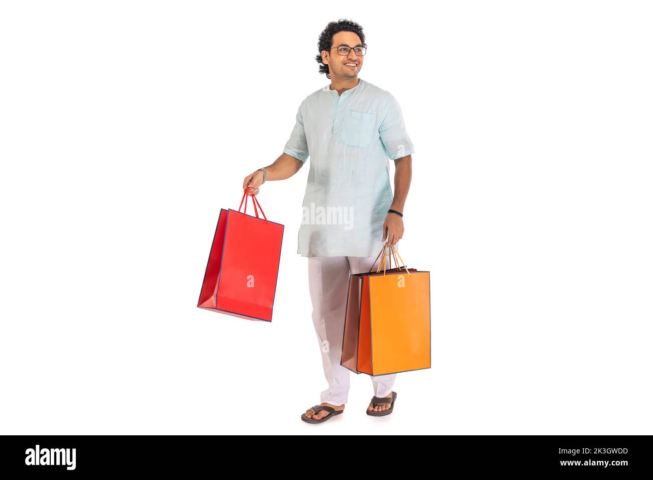 Man carrying shopping bags Cut Out Stock Images & Pictures - Alamy