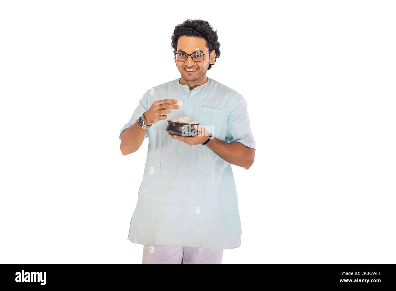 Portrait of Bengali man standing with a rosogolla handi Stock Photo Alamy