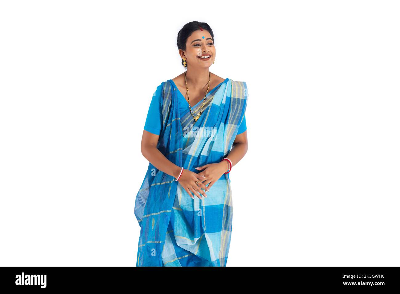 Portrait of Bengali housewife gesturing against white background Stock Photo