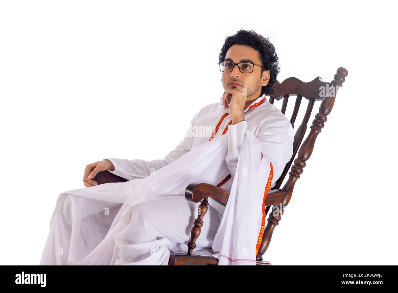 Portrait of Bengali man sitting on rocking chair against white background Stock Photo Alamy
