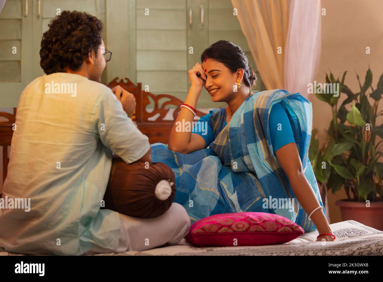 Portrait of Bengali couple talking on bed Stock Photo Alamy