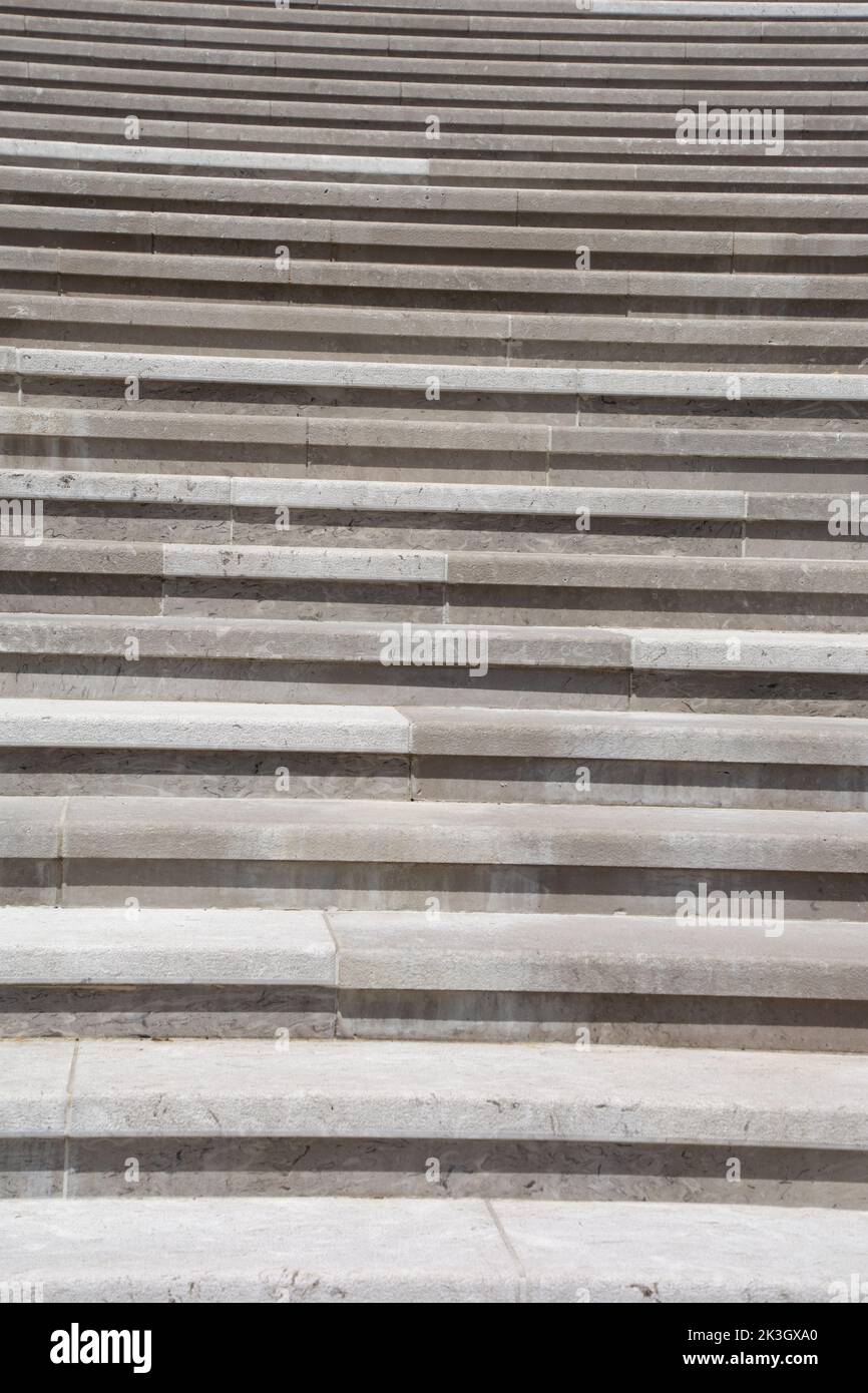 concrete upstairs of a with many steps gray staircase construction Stock Photo