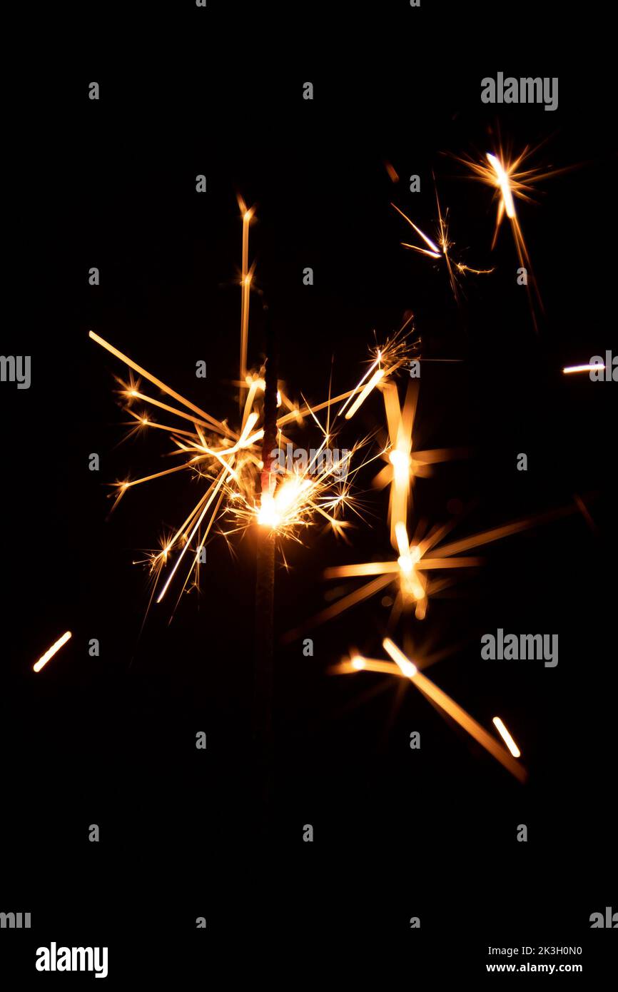Real sparkler with sparks on black background for overlay blending mode ...