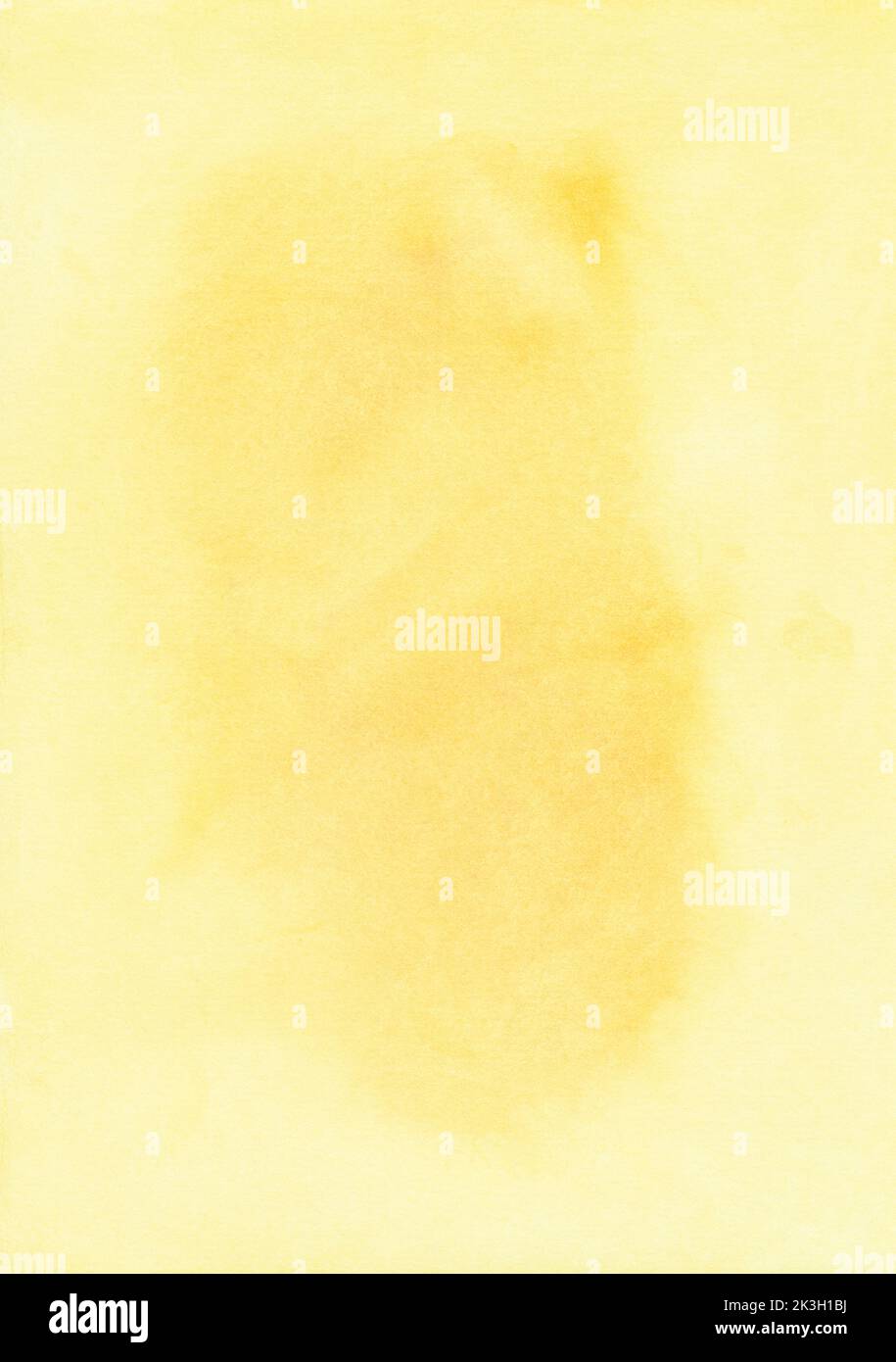 Watercolor yellow stains on paper background with space for text. Sandy color backdrop, hand