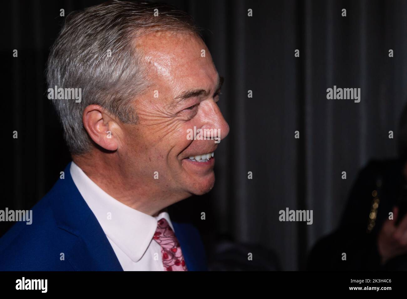 Melbourne, Australia, 26 September, 2022. Nigel Farage is seen laughing with a guest during An Evening With Nigel Farage at The Melbourne Convention and Exhibition Centre on September 26, 2022 in Melbourne, Australia. Credit: Dave Hewison/Speed Media/Alamy Live News Stock Photo