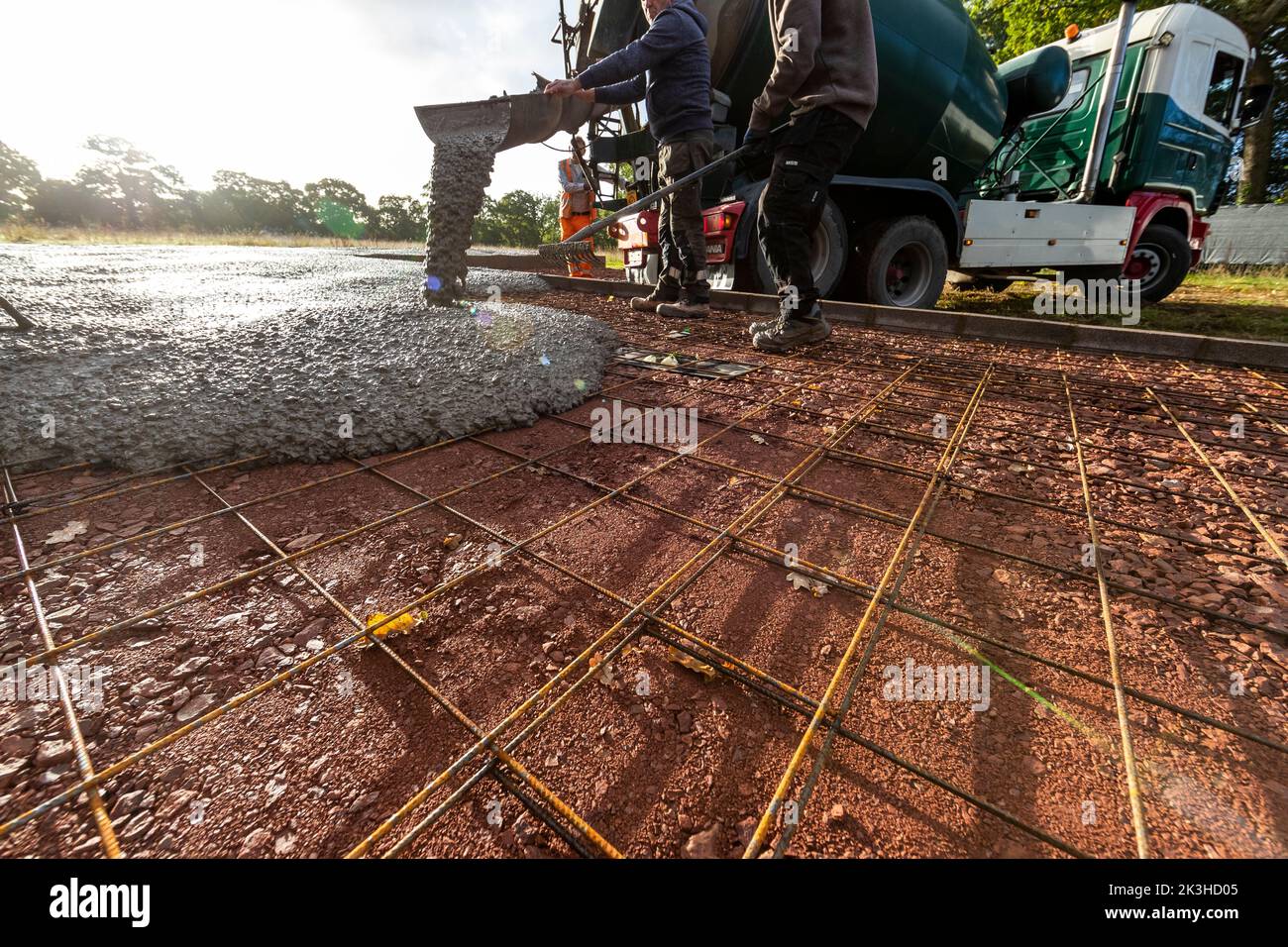 Early morning concrete pouring of a stable block slab. Seen as lacking "green" credentials, a
