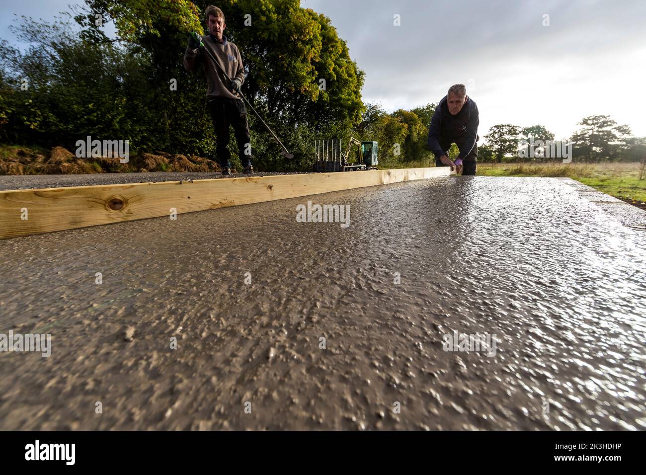 Early morning concrete pouring of a stable block slab. Seen as lacking "green" credentials, a