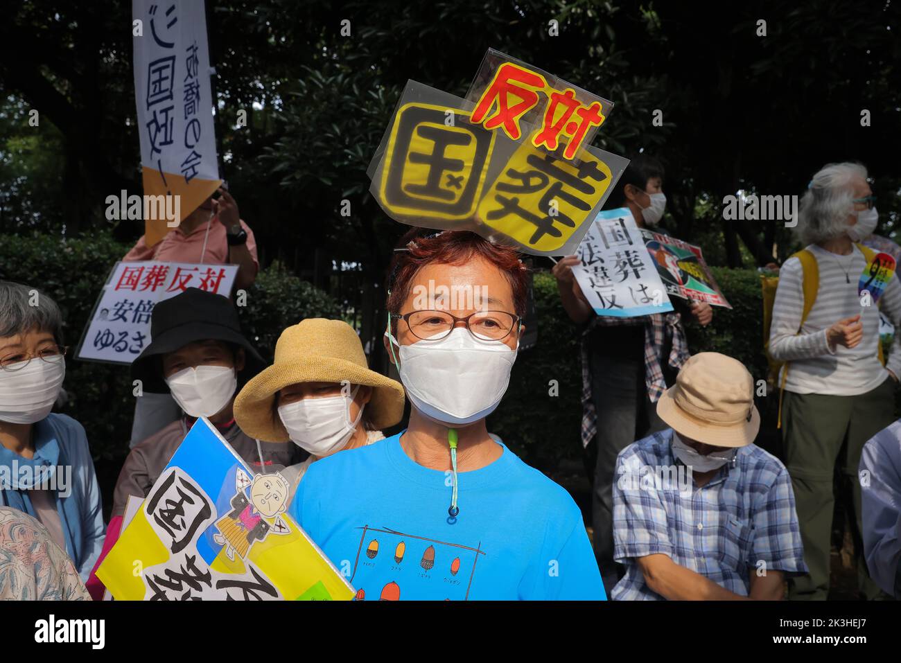 Tokyo, Japan. 27th Sep, 2022. Protesters hold placards expressing their opinions during the demonstration. Demonstrators gathered in front of the National Diet Building (Tokyo) to express their dissatisfaction with the government's decision to give former Japanese Prime Minister Shinzo Abe a state funeral. They criticize the high costs and the late timing of the funeral. Credit: SOPA Images Limited/Alamy Live News Stock Photo