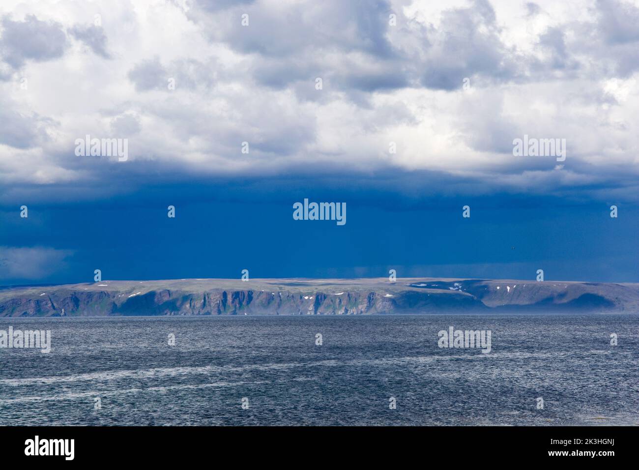Stormy clouds over fjord, Hamningberg, Varanger, Norway Stock Photo