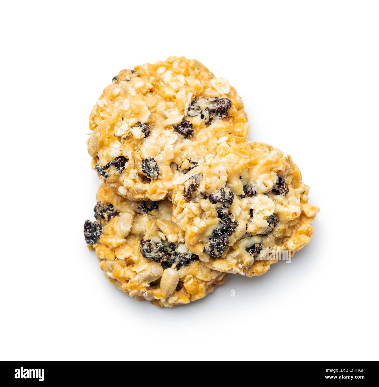 Wholegrain oat cookies. Cookies with oatmeal and raisins isolated on the white table. Stock Photo
