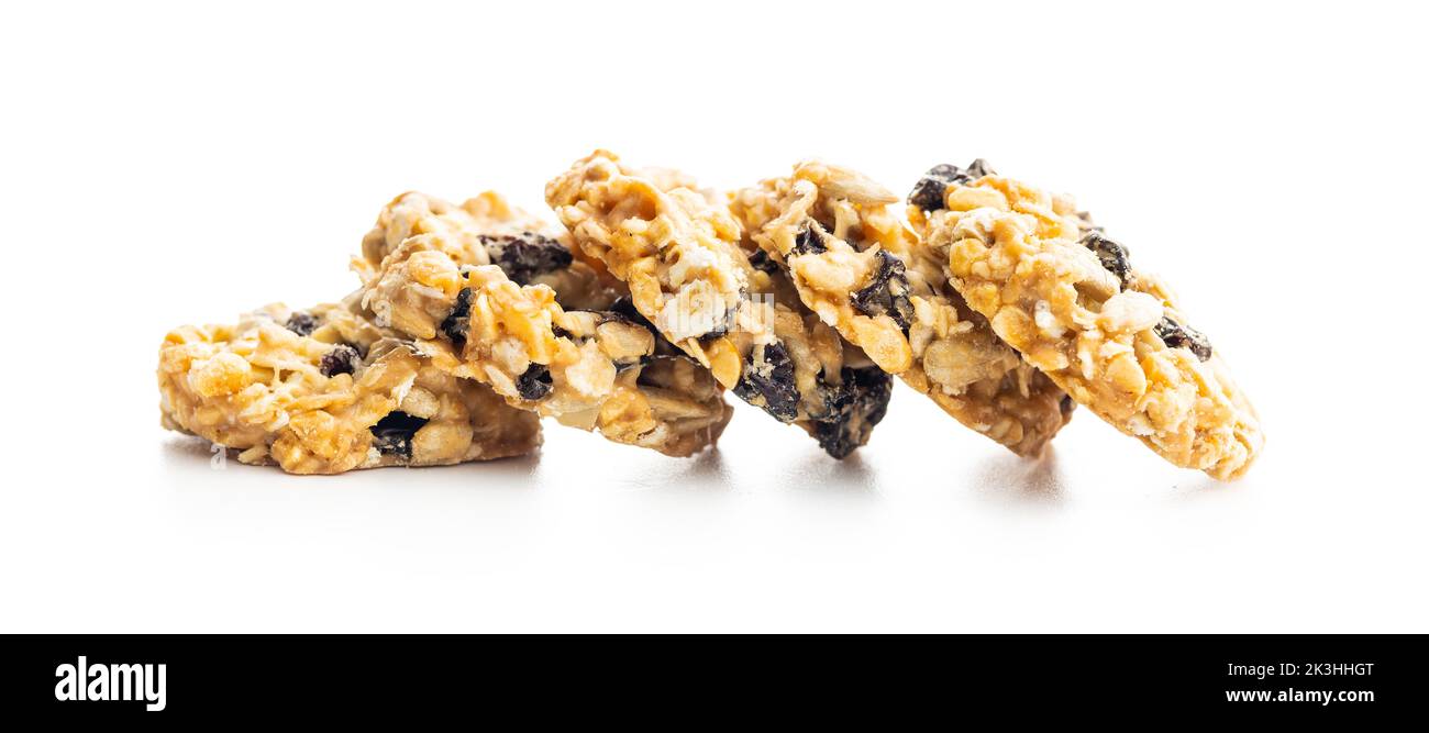 Wholegrain oat cookies. Cookies with oatmeal and raisins isolated on the white table. Stock Photo