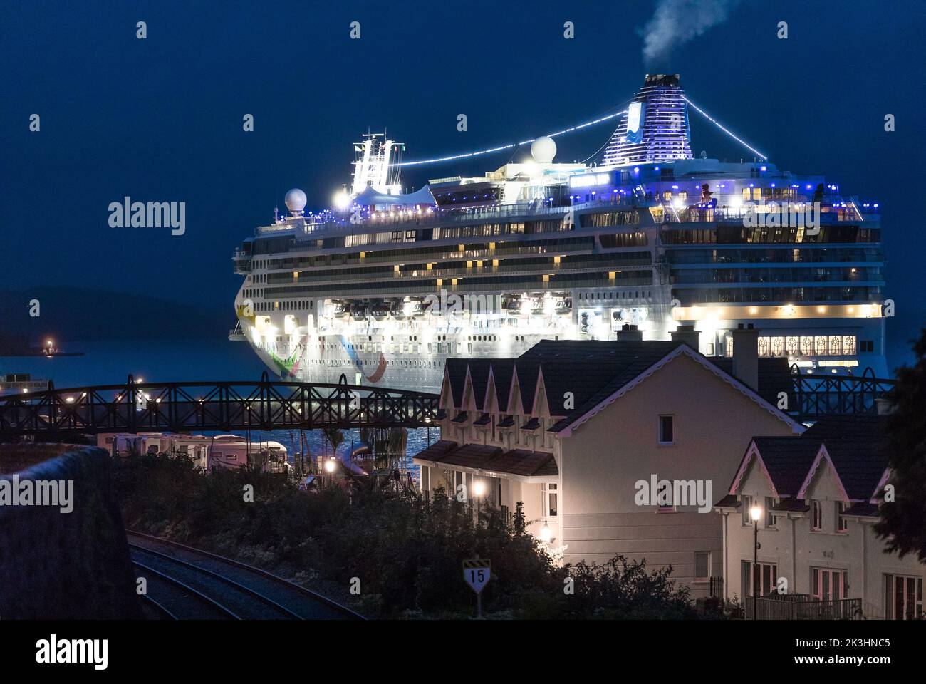 Cobh, Cork, Ireland. 27th September, 2022. Cruise ship Norwegian Dawn approaches its berth behind the seafront homes in Cobh, Co. Cork, Ireland. - Picture David Creedon Stock Photo