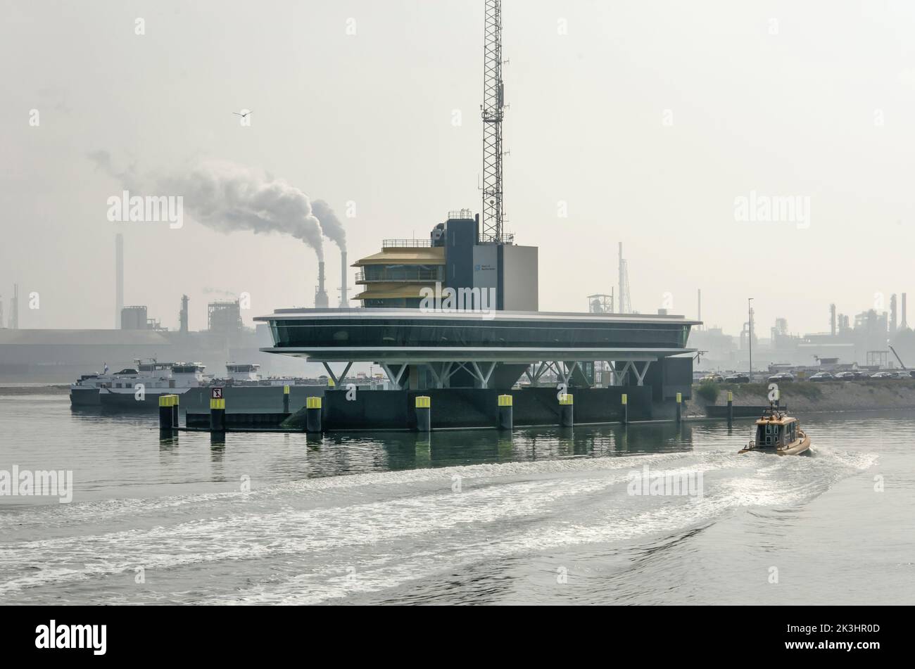 Rotterdam, The Netherlands, Spetember 4, 2022: small vessel arriving at the harbour radar control center in Botlek industrial area Stock Photo