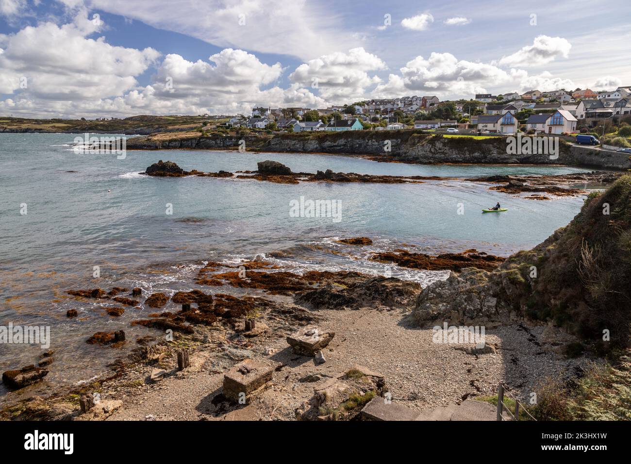 Paddleboard at Bull Bay, Anglesey, North Wales Stock Photo