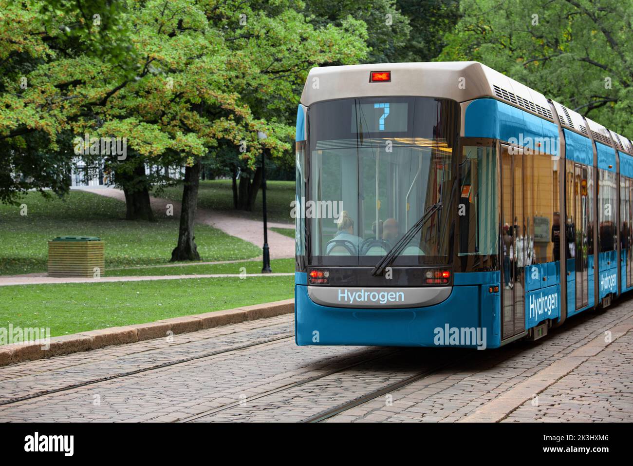 Concept of hydrogen fuel cell tram on a city street  Stock Photo