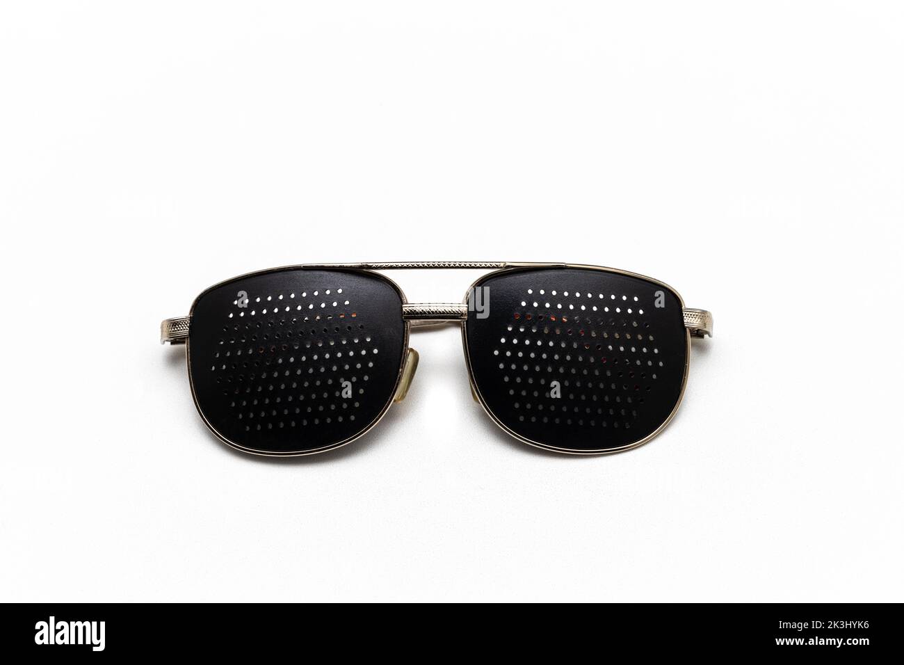 glasses to improve vision on a white background. and cataract. treatment and prevention