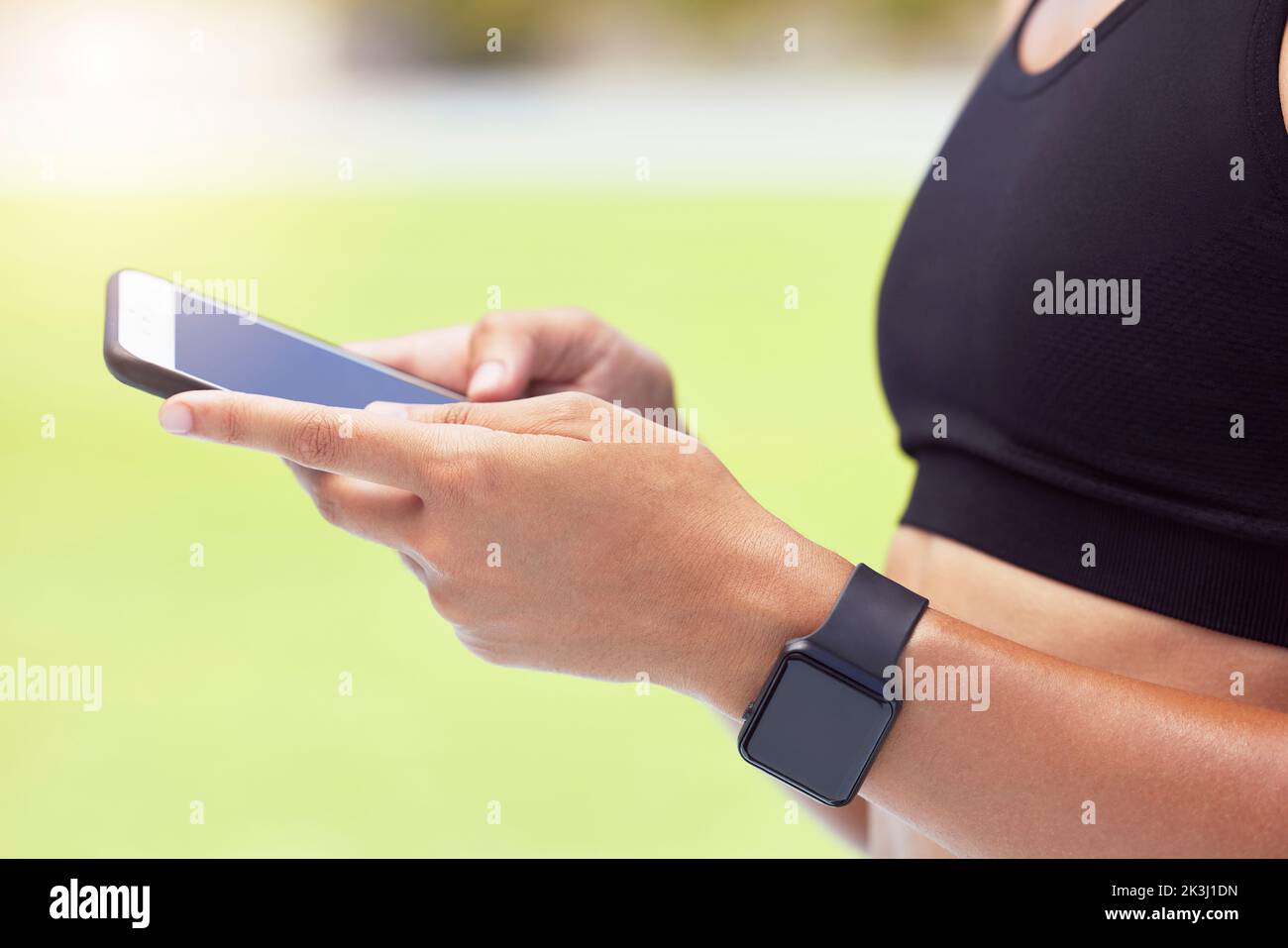 Exercise, smartwatch and woman with phone on fitness app for outdoor workout. Technology, innovation and sports on smartphone with data and digital Stock Photo