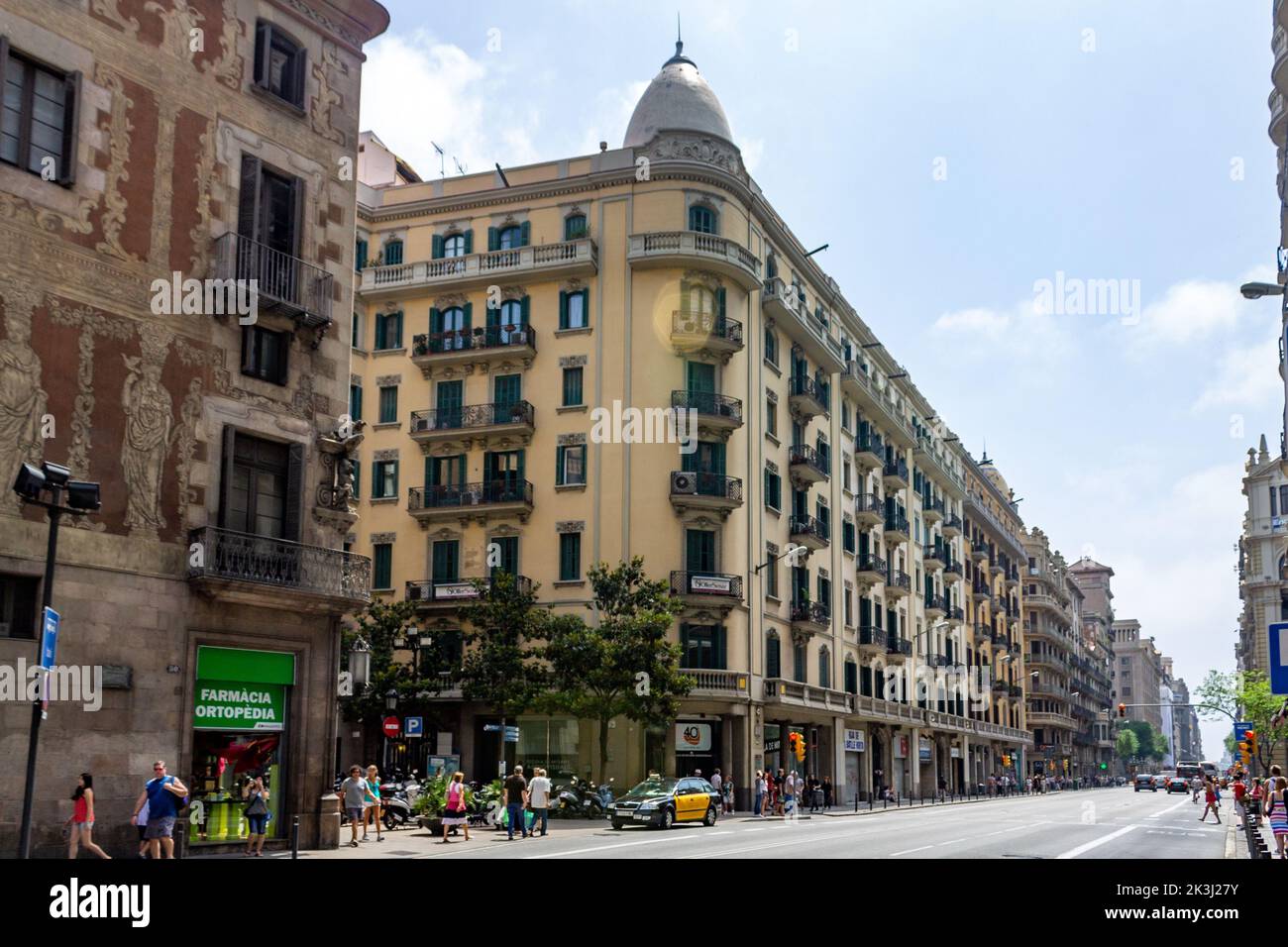 The street side building's facades under the blue sky in Barcelona Catalonia, Spain Stock Photo