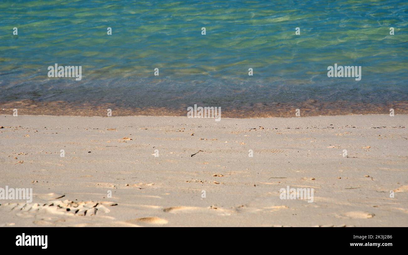 Sand and Sea - footprints - Aruba august 2022 Stock Photo