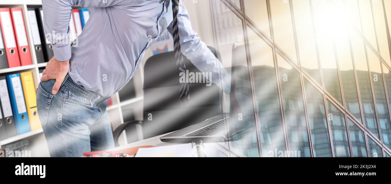 Businessman suffering from back pain in office; multiple exposure Stock ...