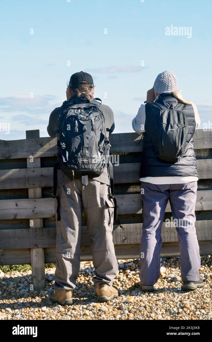 two people bird watching at carlton marshes oulton broad suffolk england Stock Photo