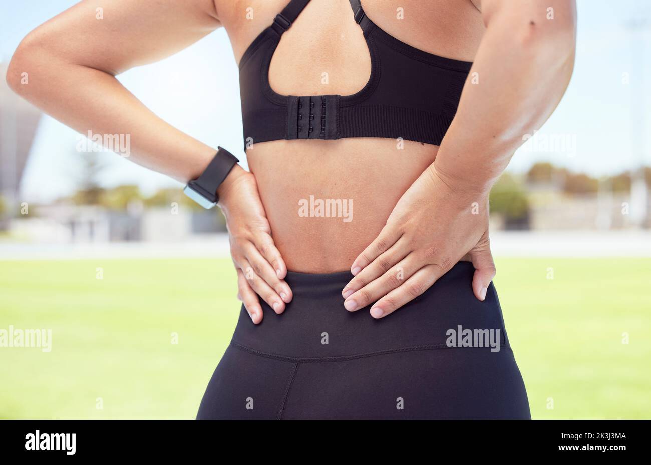Fitness woman back pain, sports injury and muscle problem from training, workout and exercise