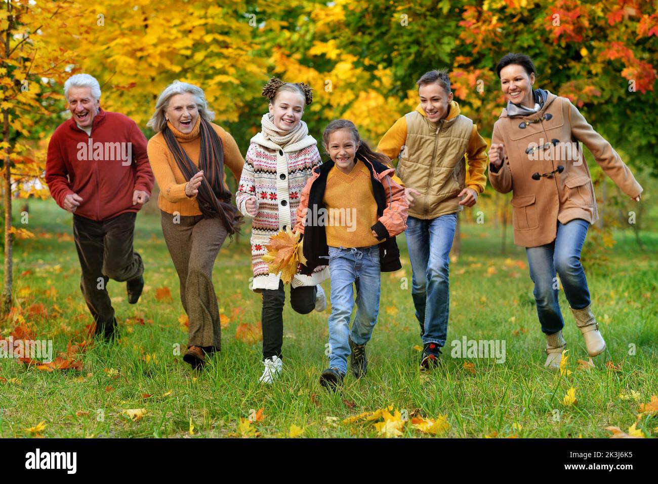 Portrait of a large family of six in autumn Stock Photo