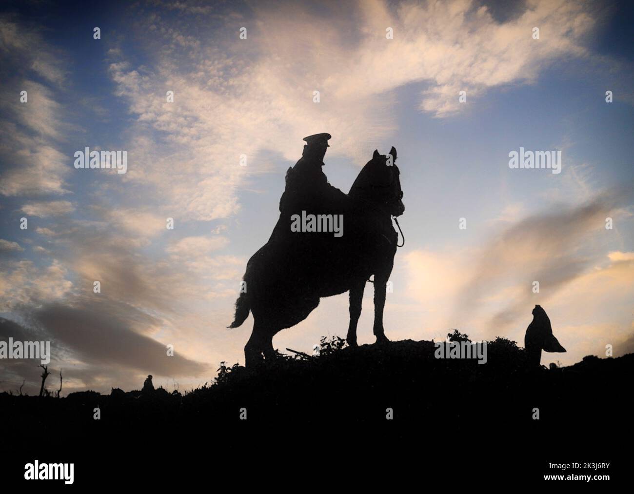 A single soldier on his horse, during a cavalry patrol in World War I. At the start of the war every major army had a substantial cavalry, and they performed well at first. However, the development of barbed wire, machine guns and trench warfare soon made attacks from horseback far more costly and ineffective on the Western Front. Stock Photo